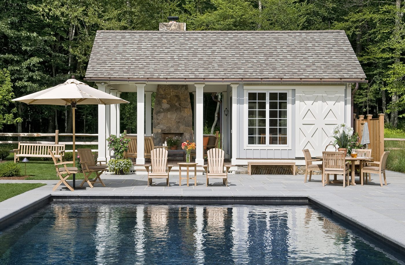 Service Area Poolside pavilion reflected in a still pool