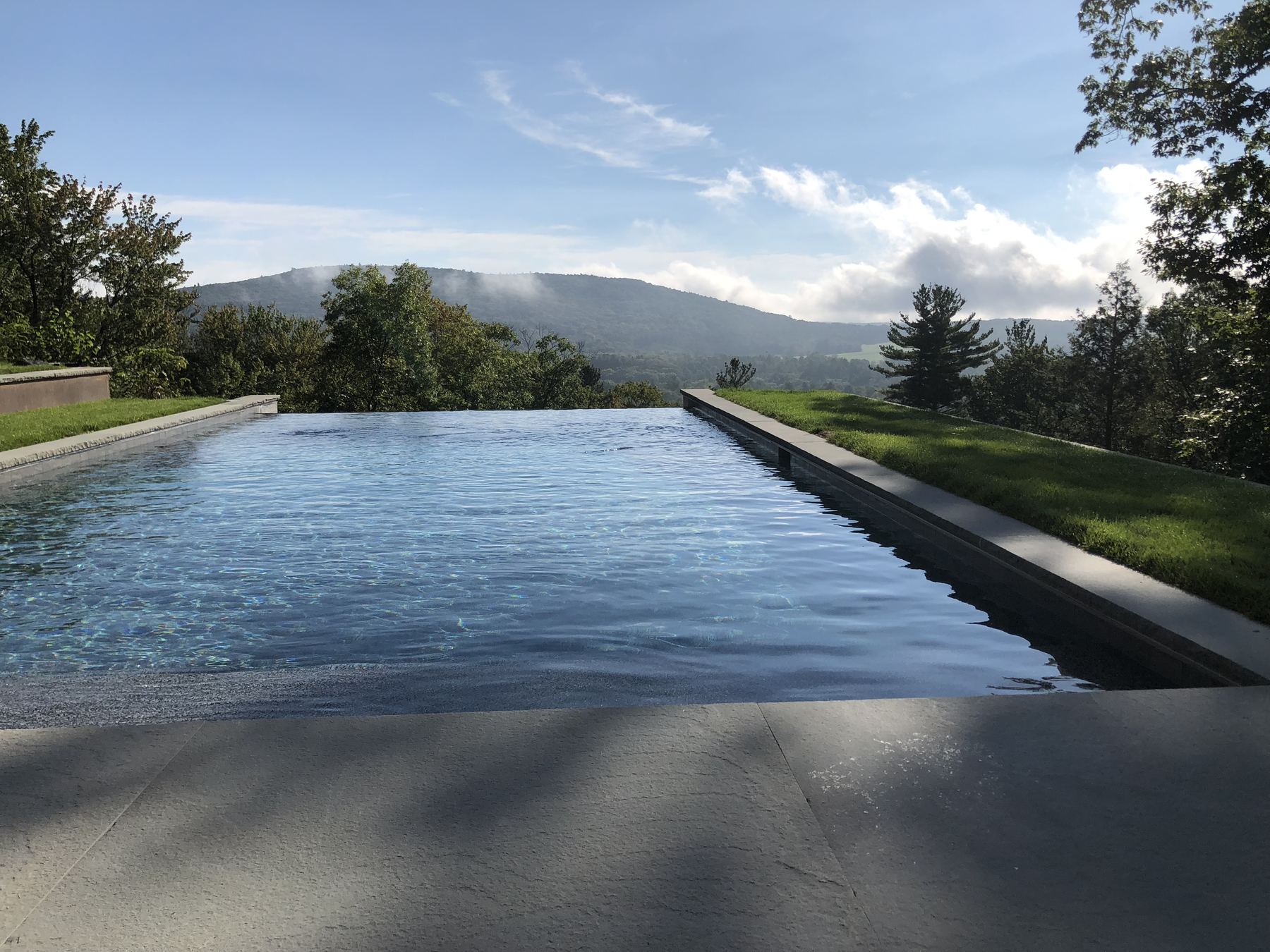 Service Area Infinity pool overlooking the Berkshire hills at dawn